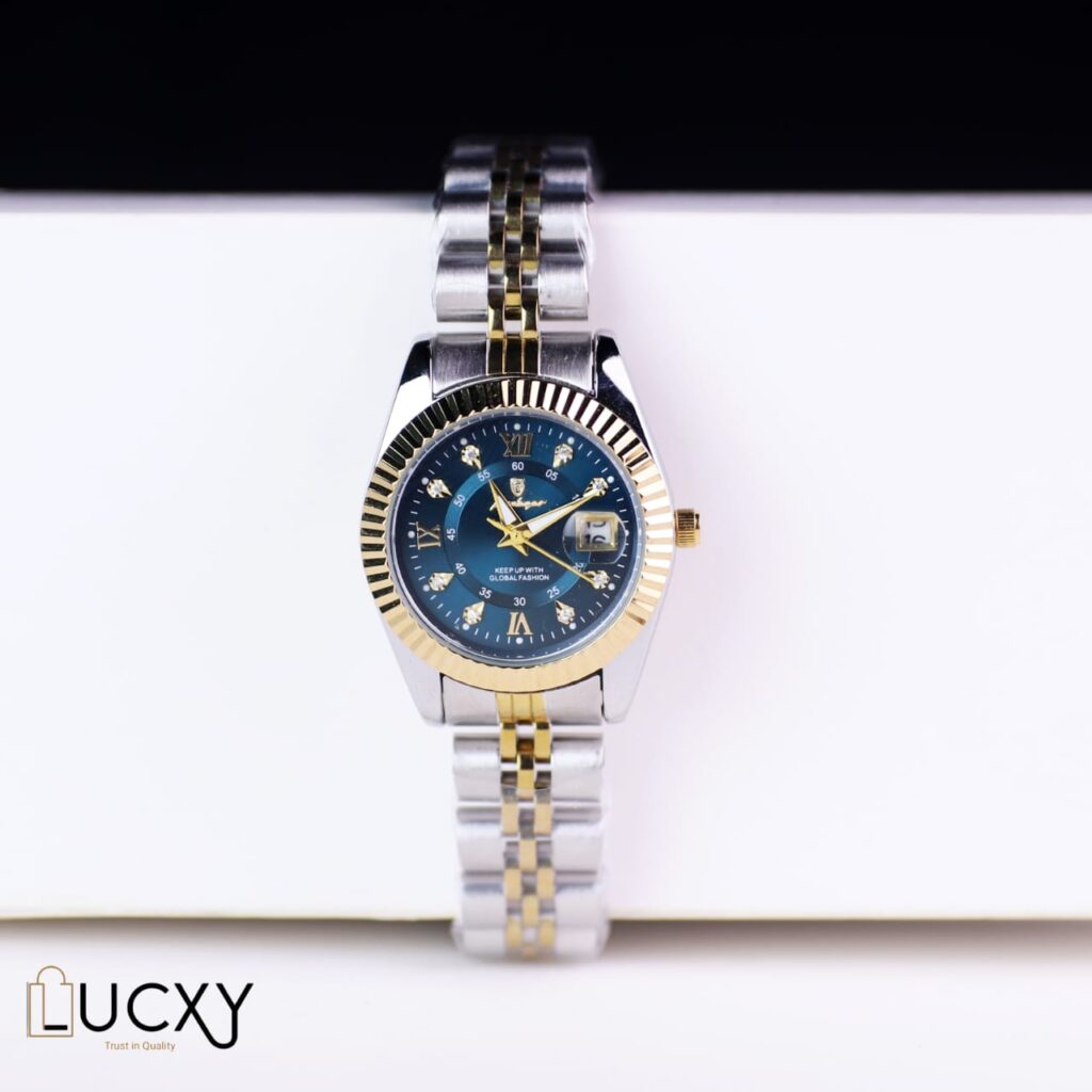"Elegant women's wristwatch with a stainless steel case, mother-of-pearl dial, and crystal hour markers, displayed on a light background."